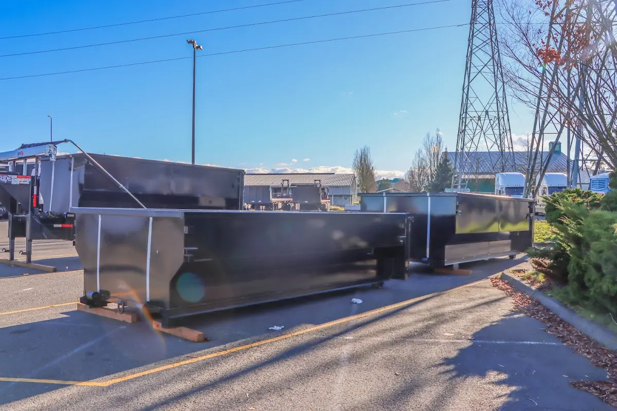Roll-off dumpster ready for waste disposal at job site for 15 Yard Dumpster Rental in Caledonia